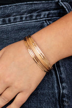 Load image into Gallery viewer, Paparazzi This Girl Is On Wire Gold Cuff Bracelet
